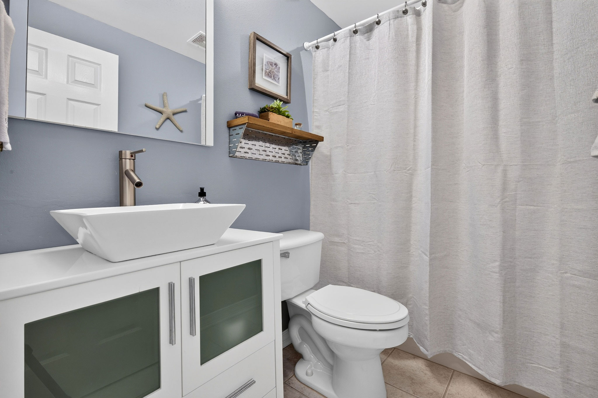 Guest bathroom · Tub and shower